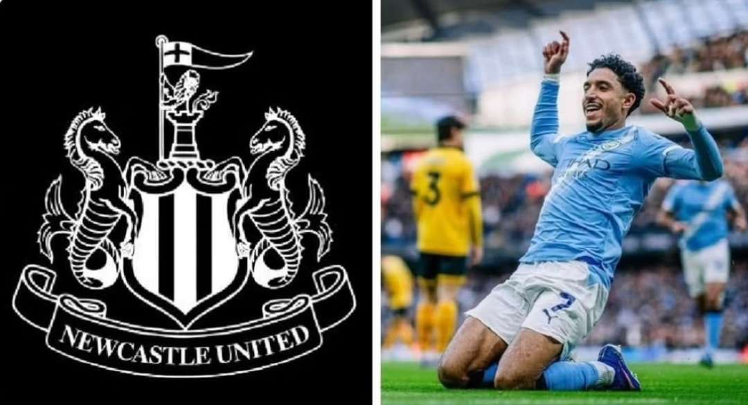 a man in a blue shirt is celebrating